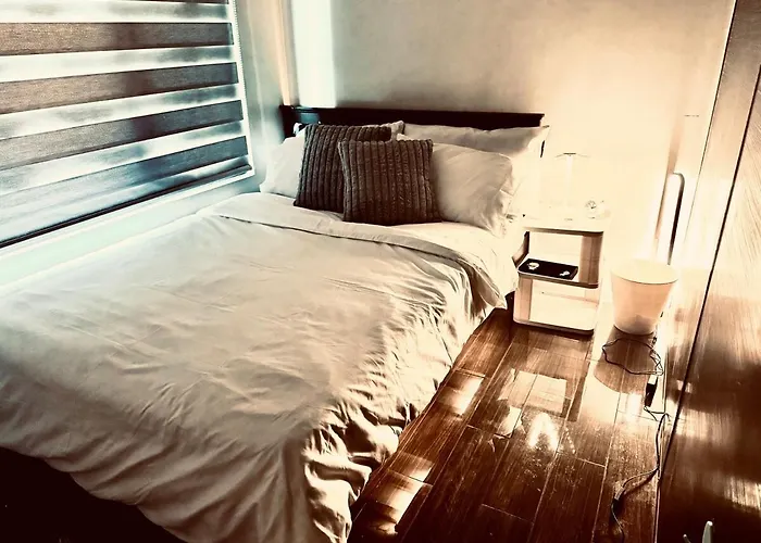 Luxurious 2 Bedroom Oasis In Air Residences With Bar Ktv And Games Apartment Manila