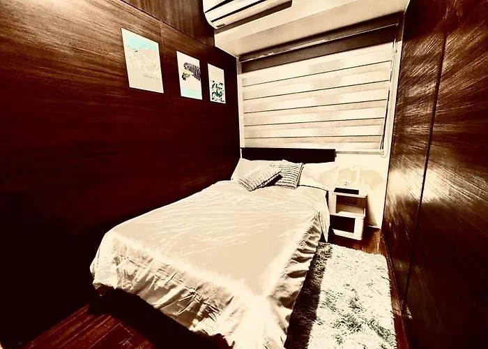 Luxurious 2 Bedroom Oasis In Air Residences With Bar Ktv And Games Manila